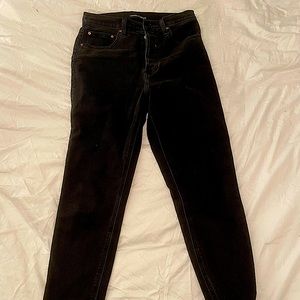 Black button up straight leg jeans